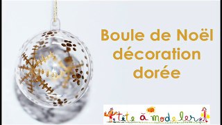 Boule de Noël à la décoration dorée