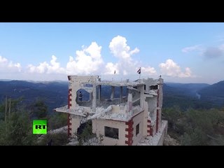 下载视频: Drone flyby: Syrian mountain village just liberated from jihadists