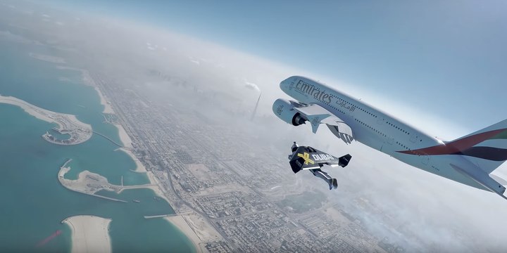 Two Guys Wearing Jetpacks Weave Around Airbus A380