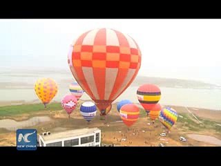 Hot air balloon competition over Chinas largest fresh water lake