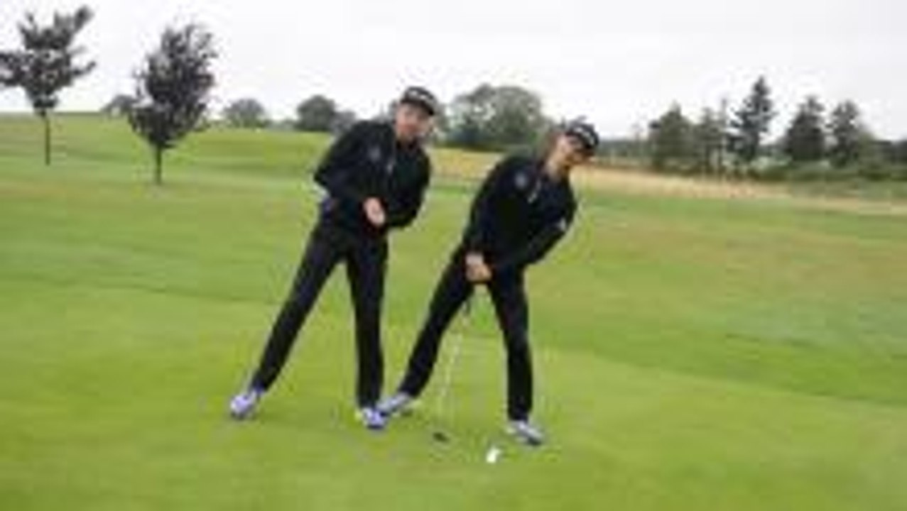 Chipping from a downhill lie