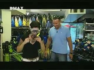 A woman learning scuba diving German TV show