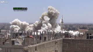 Syrian Air Force Drops Large Bomb In Downtown Daraa City