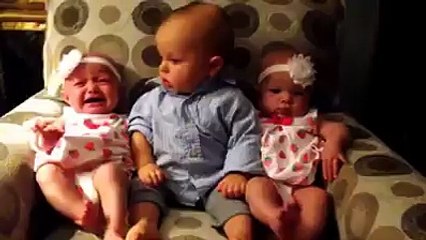 Cute baby boy with sweet baby girls