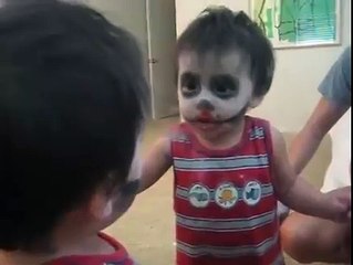 Baby Scares himself in the mirror