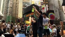 Hong Kong protesters defy Beijing, pack streets