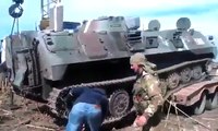 Ukraine War Militia fighters take armored vehicles captured from the Ukrainian military