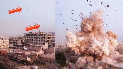 Watch the Syrian regime bomb a rebel position, obliterating a building in Daraya