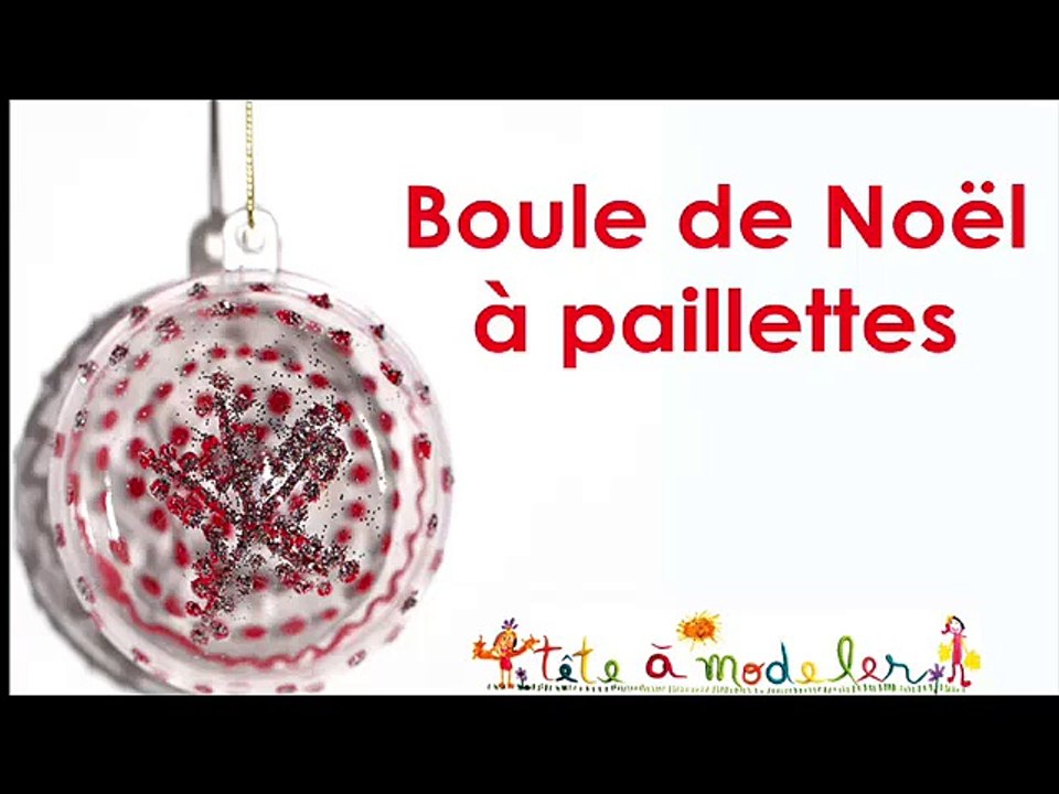 Boule de Noël transparente motifs rouges