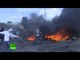 Burning tires, tear gas & stones: Palestinian youths clash with Israeli forces