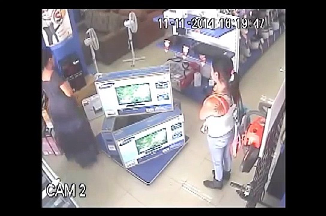 The Thief Dress: Woman Steals Appliances Hiding Under Her Dress
