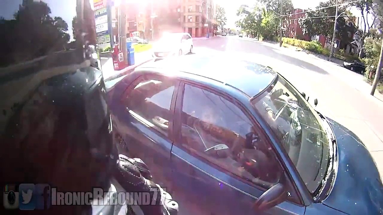 Motorcycle Crashes Into Car