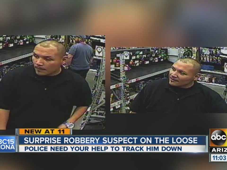Surprise robbery suspect on the loose