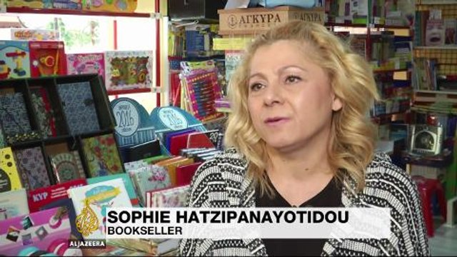 Police and anti-austerity protesters clash in Athens