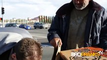 Giving Homeless People Some Pizza or Food