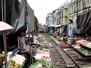 Train Passing between the Fruit Street | Hilarious and Shoking