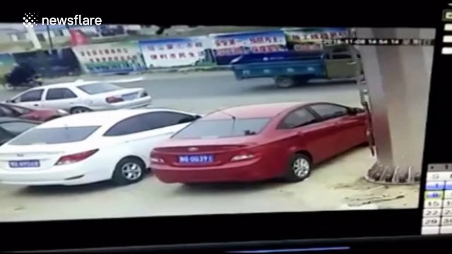 Man miraculously survives falling from second-storey of building onto car