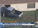 Truck crashes into south Phoenix house