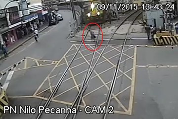 Old man is almost run over by train in Barra do Pirai