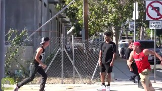 JUMPING PEOPLE IN THE HOOD PRANK (GONE WRONG)