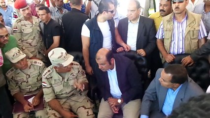 خالد حنفى وزير التموين فى زيارة لقناة السويس الجديدة وقافلة دعم للعاملين سبتمبر2014