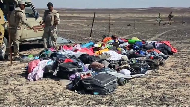 Russian officials at Russian airliner's crash site in Egypt