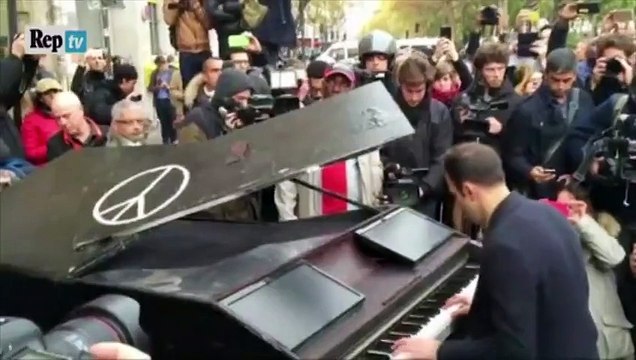 Attentats de Paris: Imagine retentit près du Bataclan