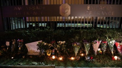 Mourners gather outside D.C.&apos;s French Embassy
