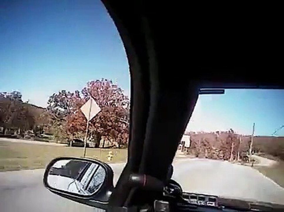 Crazy girl trying to crush a cop with her car and shooting him with a gun