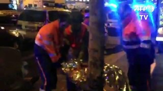 Medics evacuate injured from Bataclan concert venue in Paris