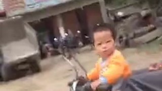 Kid Riding a Motorcycle