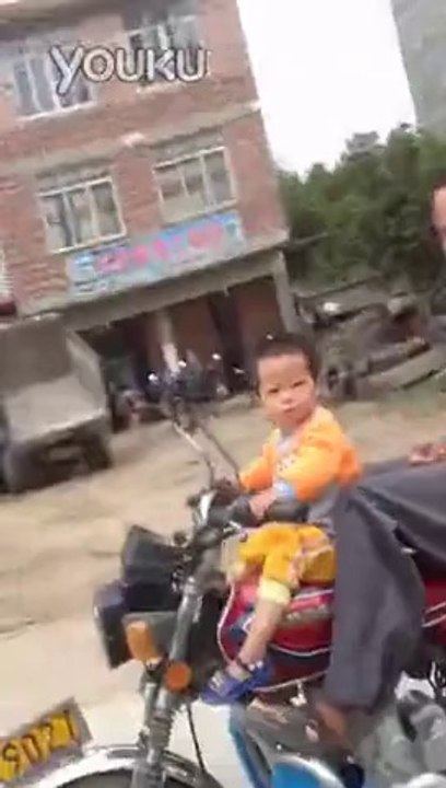 Kid Riding a Motorcycle