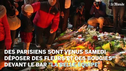 Les Parisiens se recueillent devant "La Belle Equipe"