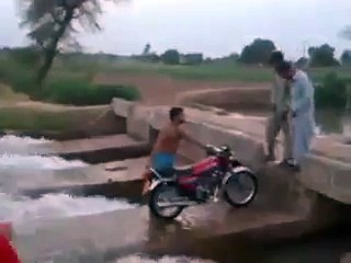 Bike Stunt (Throwing Water on Running Train)