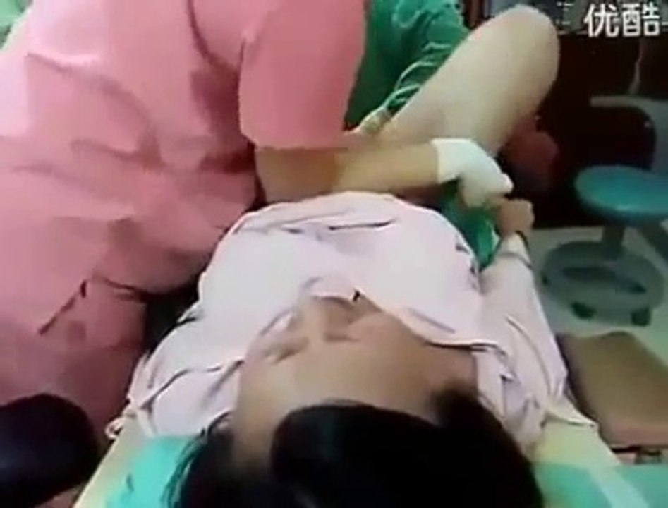 Watching one woman giving birth in hospital video