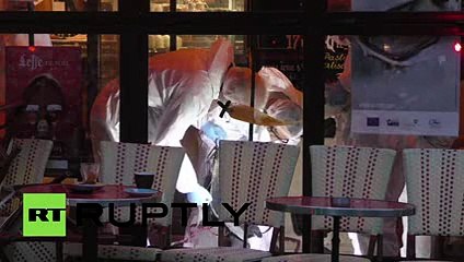 France Forestic experts inspect suicide bomber in an attacked cafe in Paris