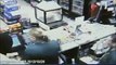 Caught On CCTV: Phone Saves Man From Robbers Bullet