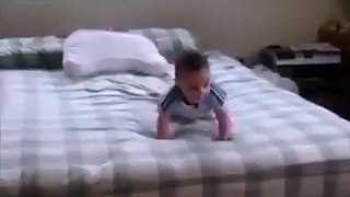 Funny baby down from bed