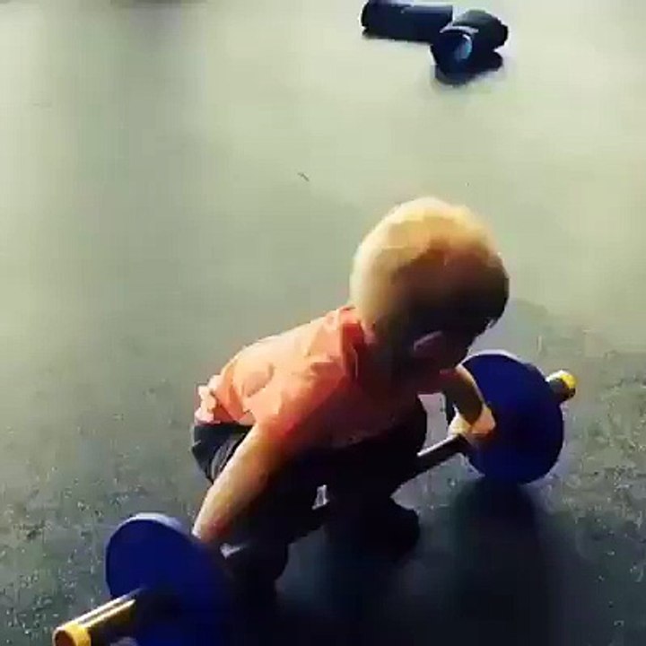 Funny baby in gym