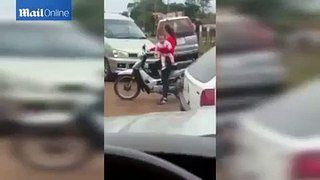 Mother Falls off Her Motorbike While Carrying her BABY!