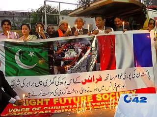 Paris Tragedy: people of different organizations light up candles in front of Lahore Press club