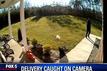 This lazy deliveryman didn't care if the package he was delivering was fragile. Once he walked a few steps into the cust