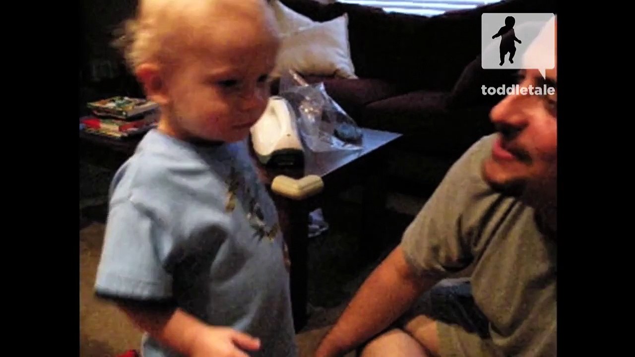 Toddler gets jealous of family dog giving kisses