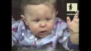 Toddler pushes his face up against car window