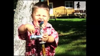 Toddler uses a drinking fountain for the first time