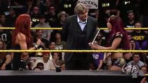 Sasha Banks and Becky Lynch sign the contract for their match at TakeOver_ WWE NXT, May 6, 2015