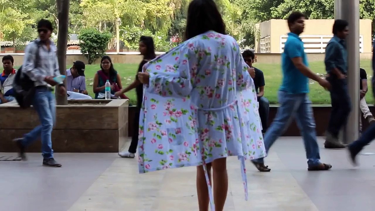 Indian girl goes topless on street: Shocking Video!