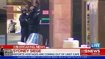 Sydney siege: Live updates as three hostages escape cafe siege