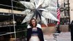 Miranda Kerr Raises Swarovski Star in New York City in Stunning Outfit