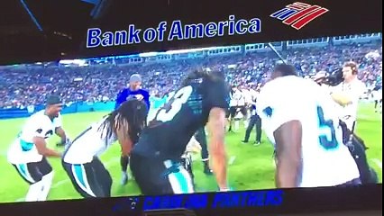 Carolina Panthers football players does the whip with a Cancer Patient